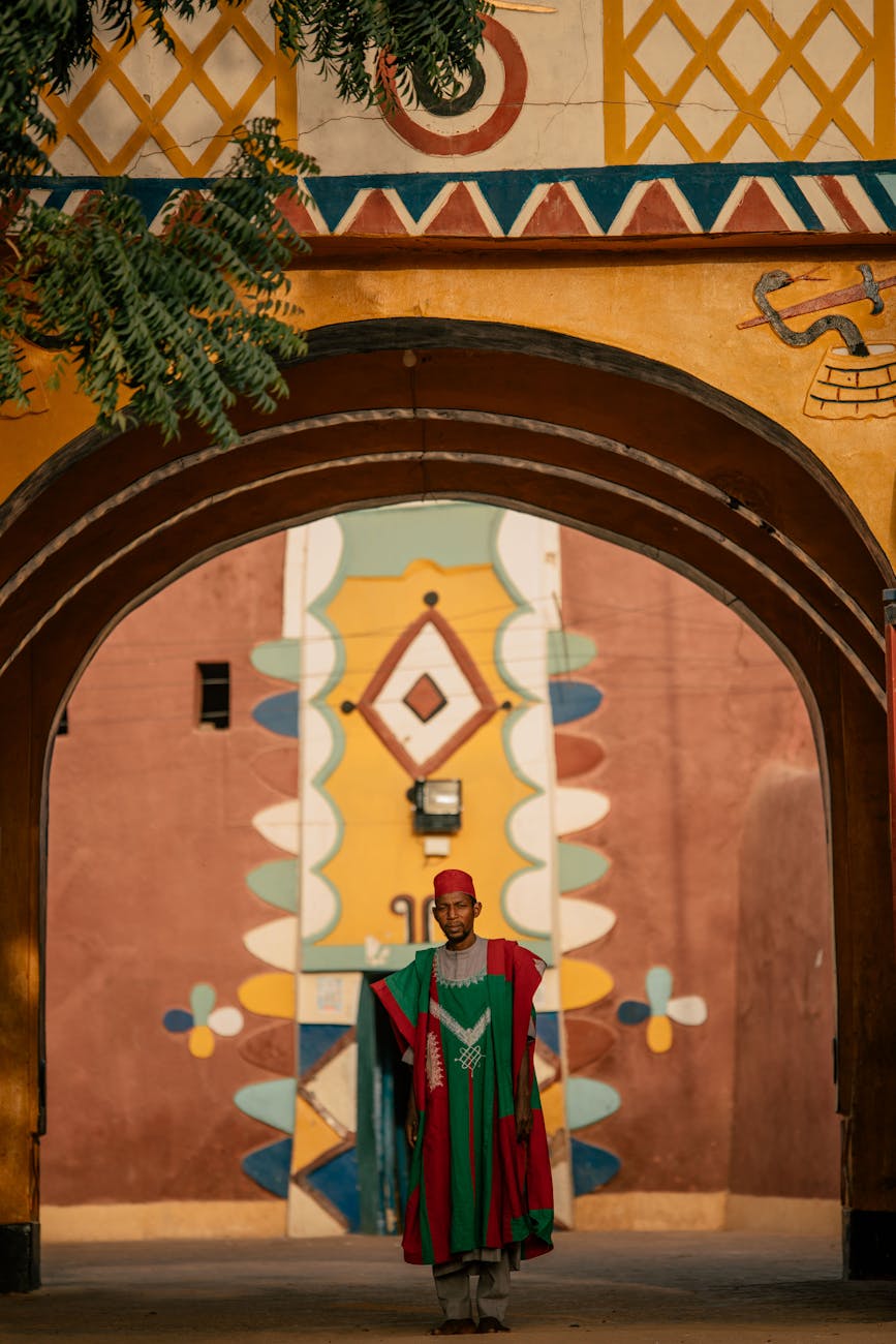 colorful african architecture with traditional attire